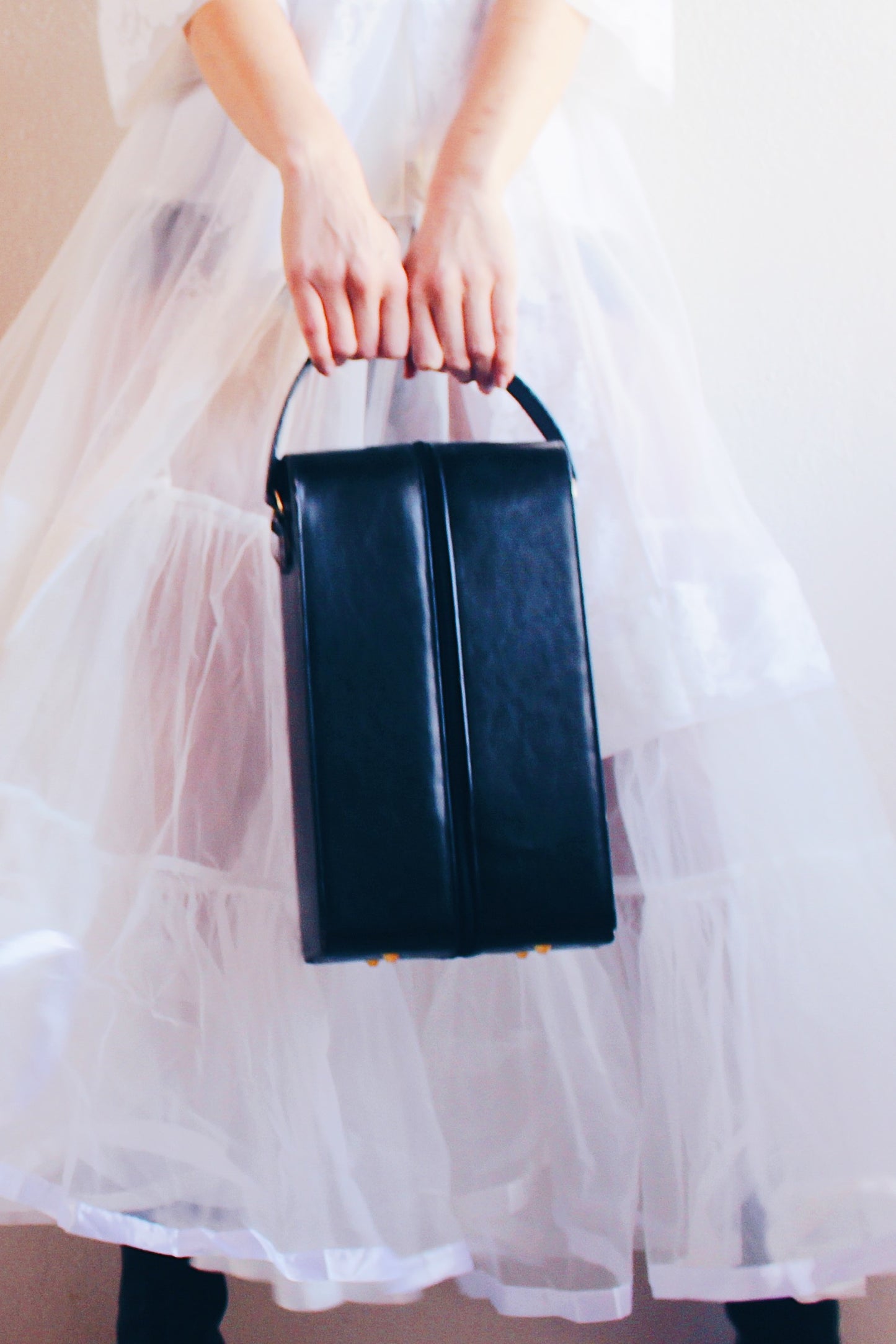 Noir Chic: Black Long Faux Leather Case - Edgy Rectangular Elegance!