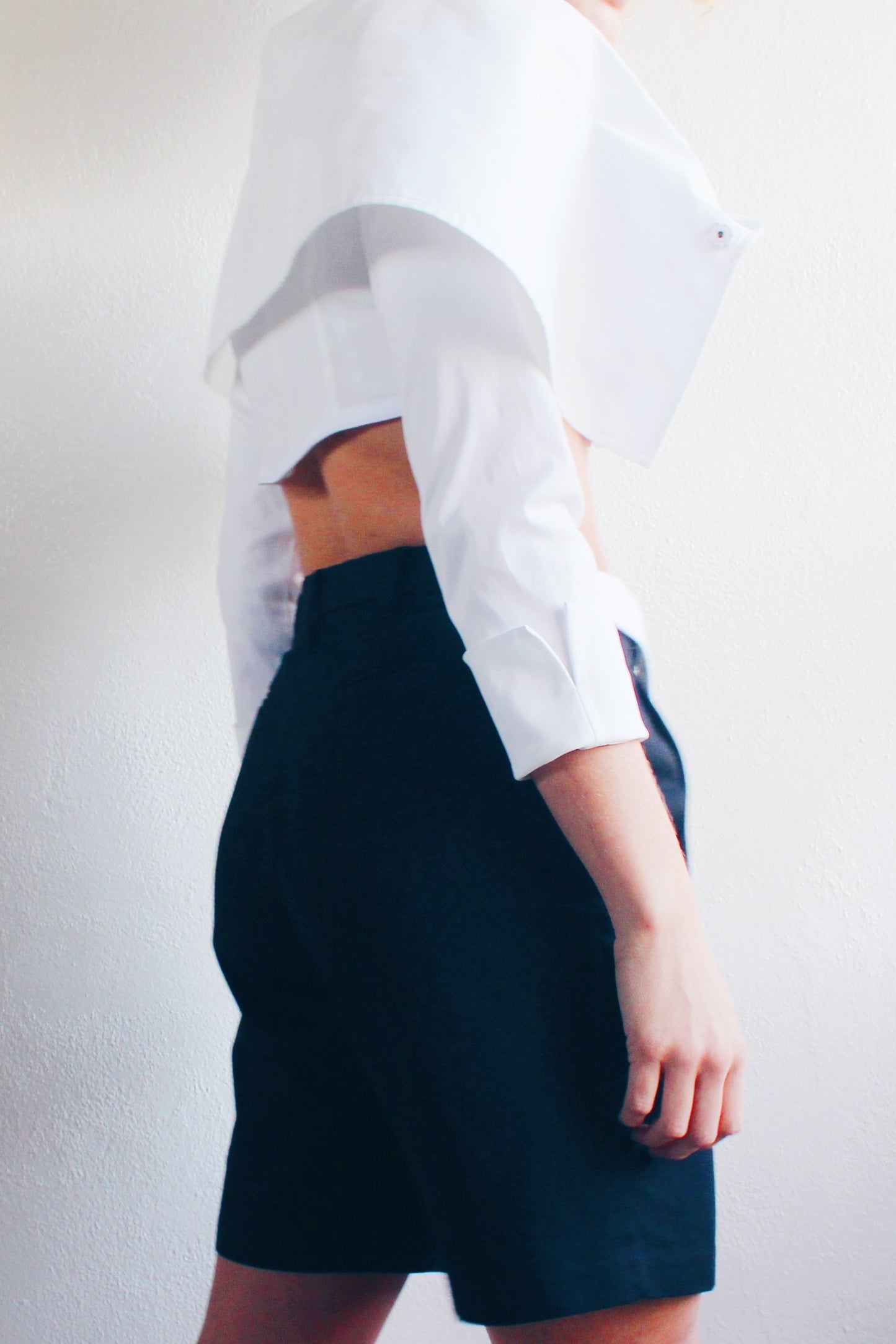 Androgynous Formal: Upcycled Black Pleated Shorts with Attached White Shirt Collar