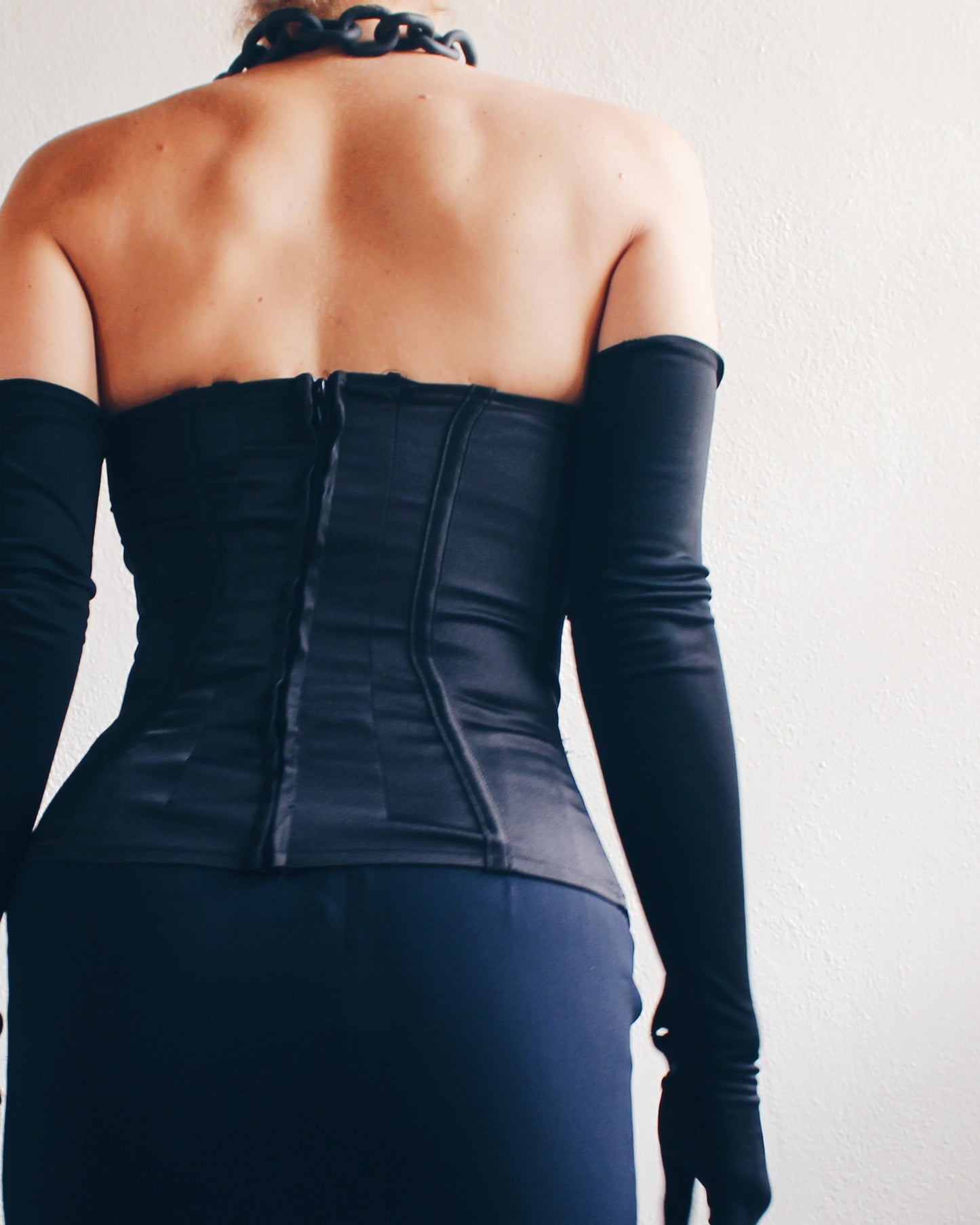 Upcycled Black Bustier with Purse Handle - Chic Contemporary Statement Piece | Sustainable & Daring Fashion