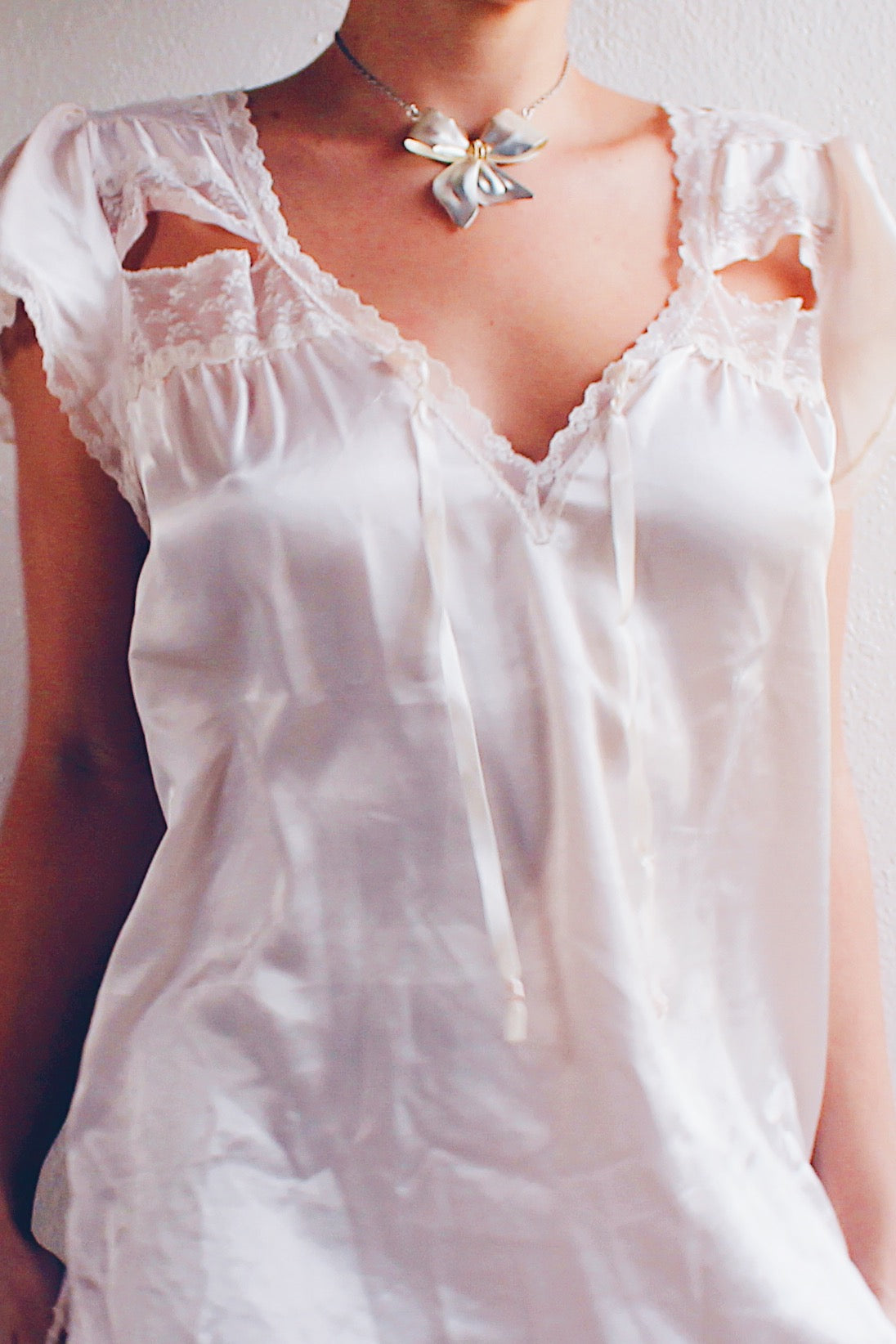 Charming Balletcore: Silver Bow Pendant Necklace for Valentine's