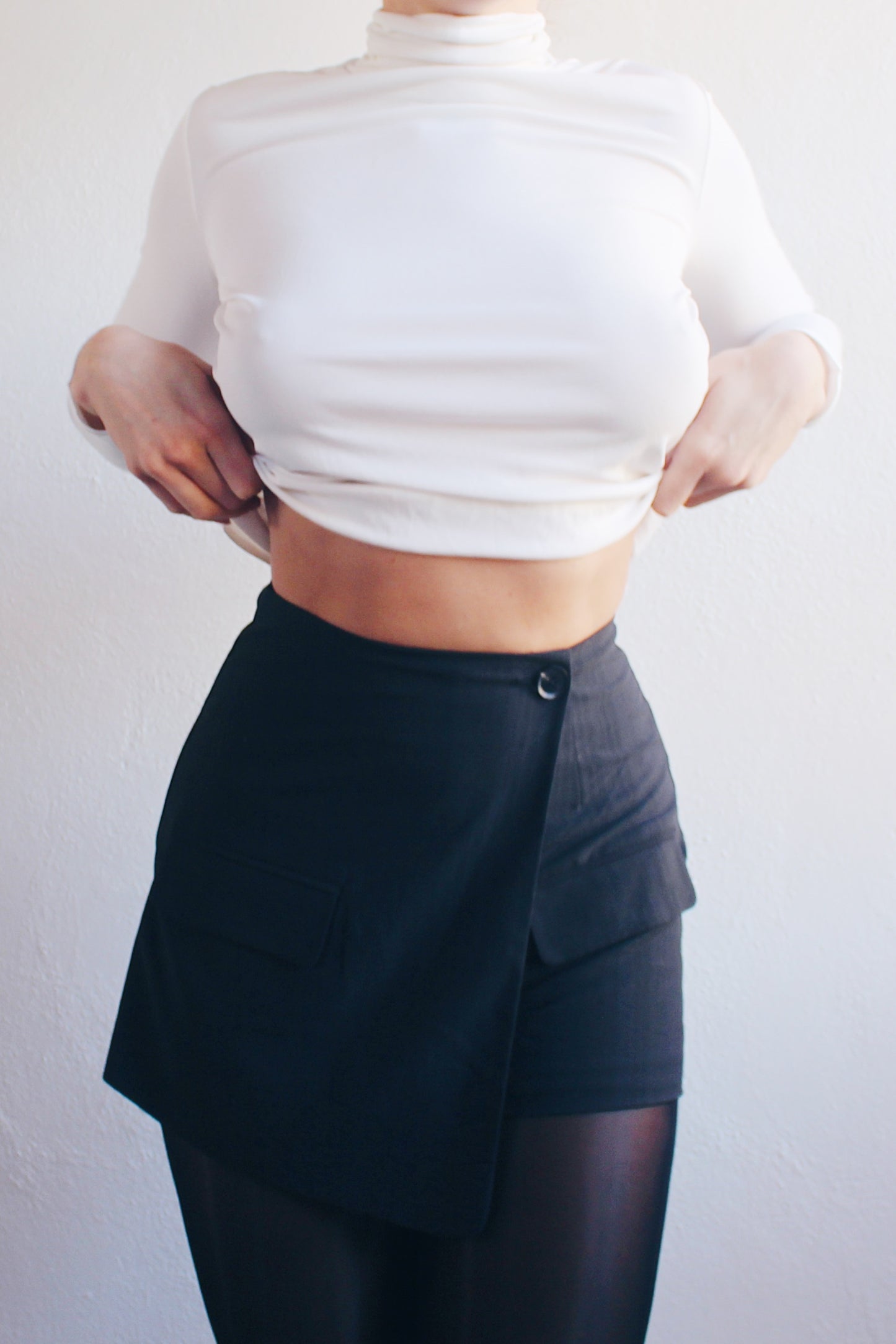 Upcycled Chic: Black Asymmetric Skort Transformed from Vintage Blazer - Sustainable Statement Piece