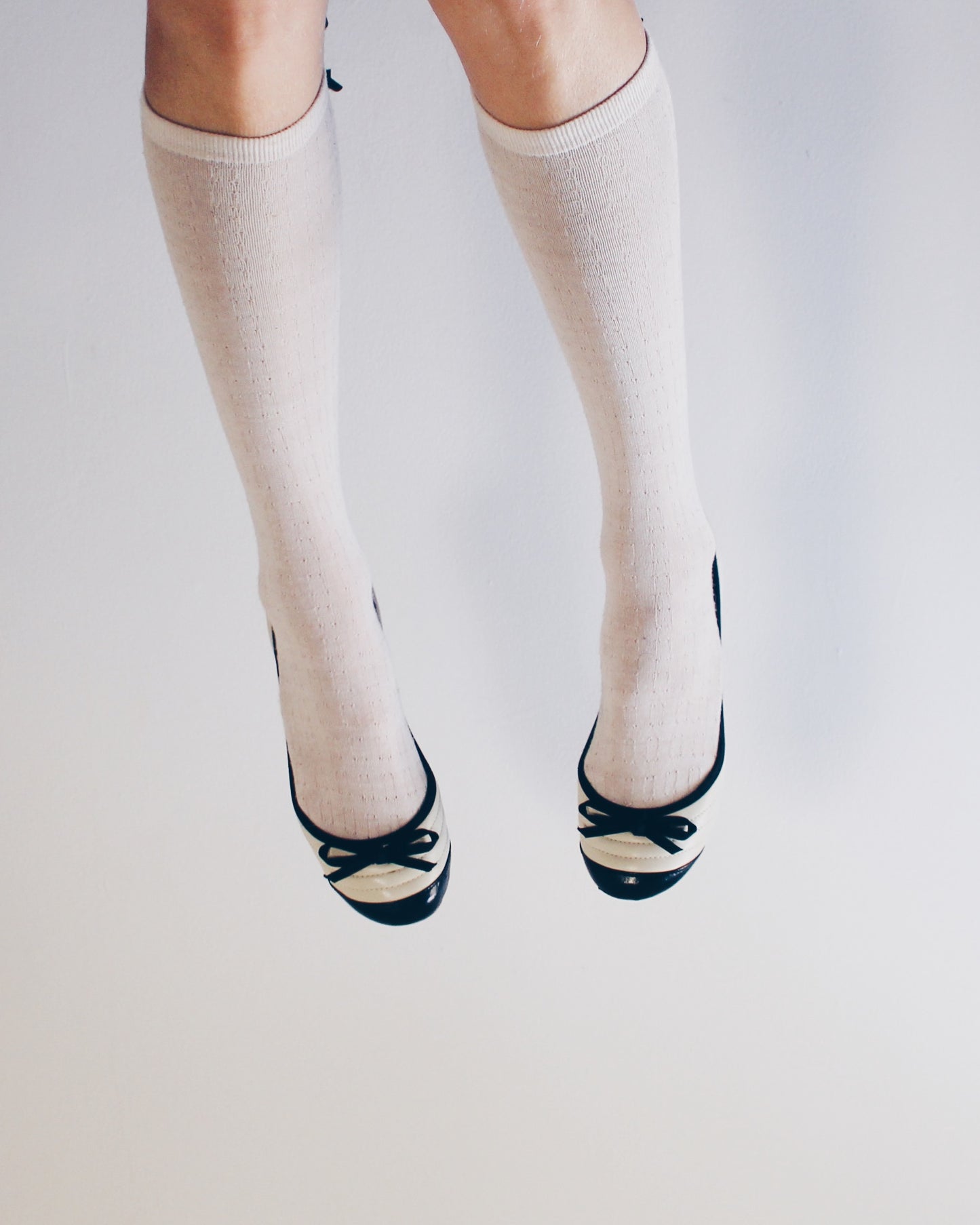 White and black bow adornment Y2K flats — Cute Bow Detail • Scholarly Coquette Ballet Shoes