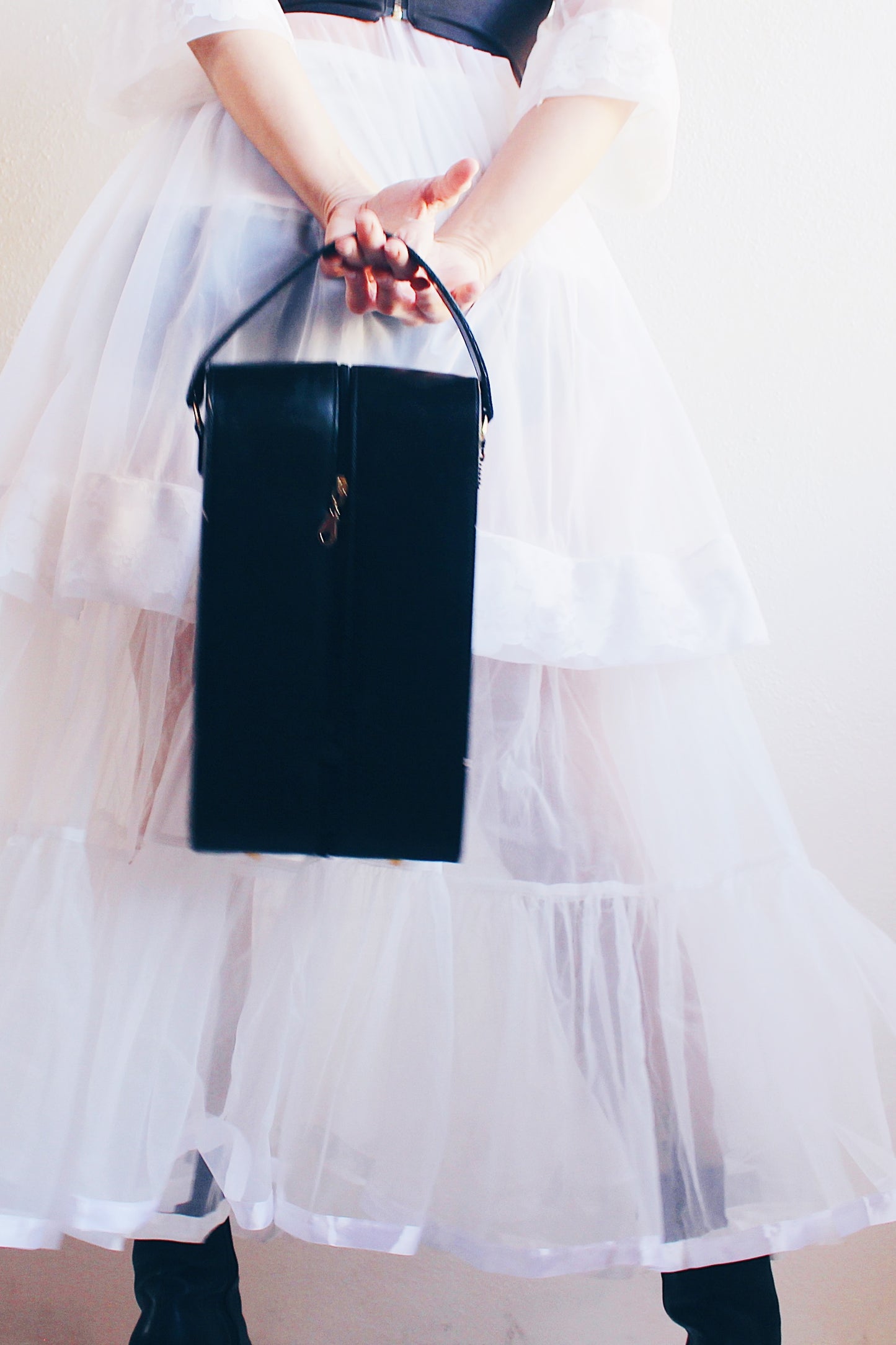 Noir Chic: Black Long Faux Leather Case - Edgy Rectangular Elegance!