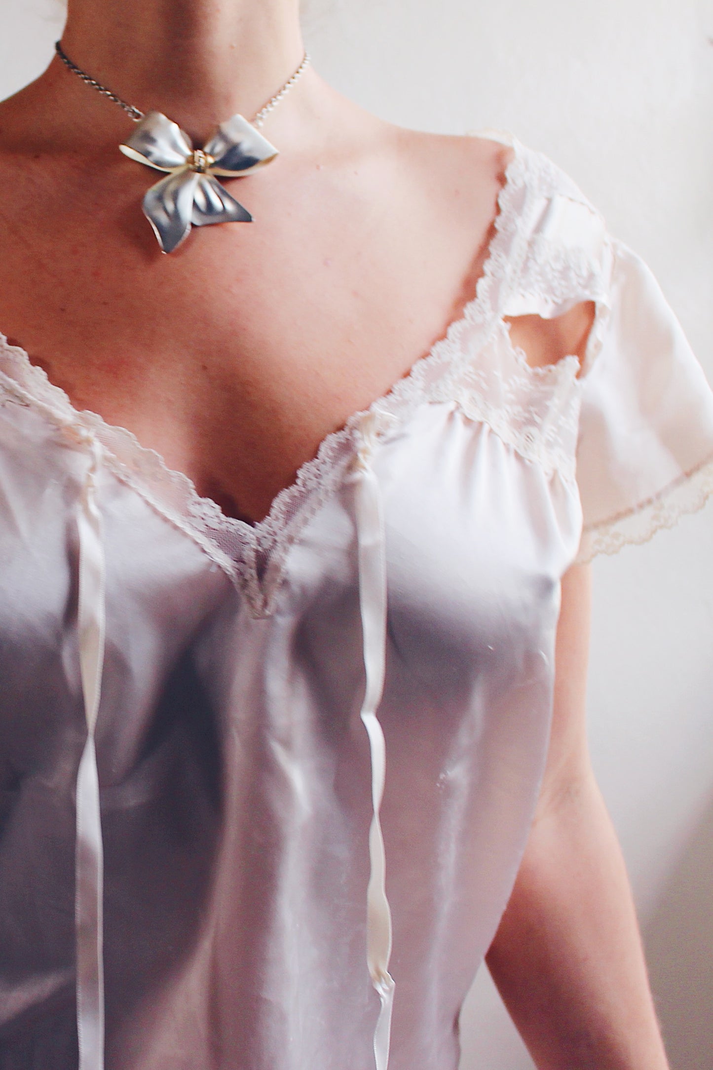 Charming Balletcore: Silver Bow Pendant Necklace for Valentine's