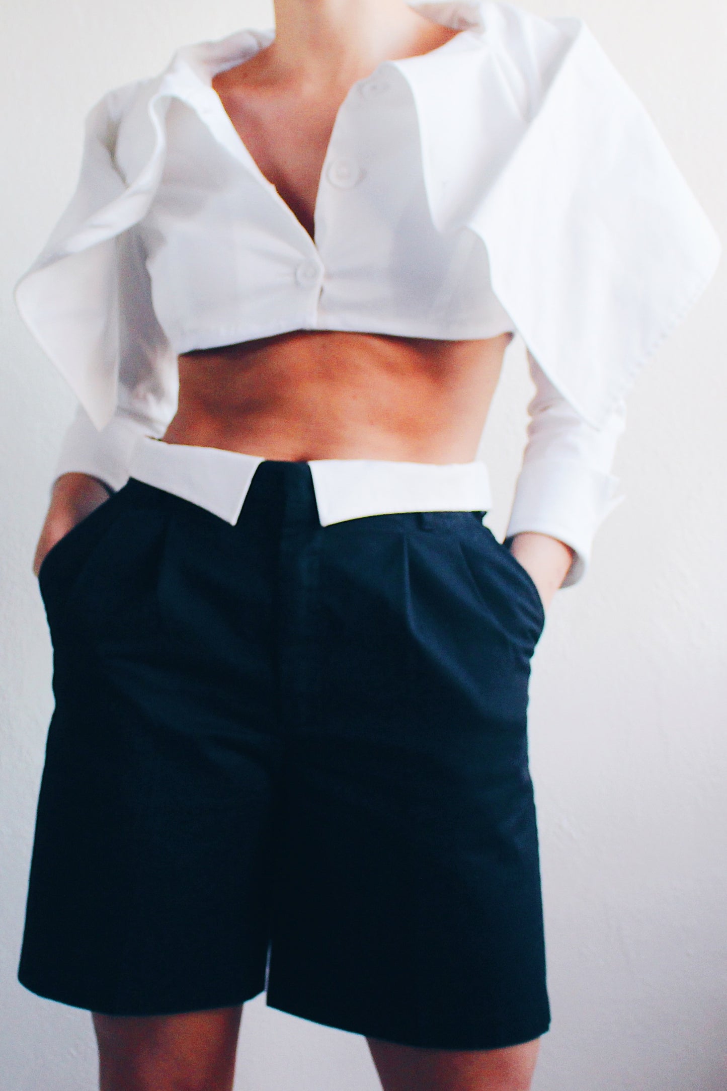 Androgynous Formal: Upcycled Black Pleated Shorts with Attached White Shirt Collar