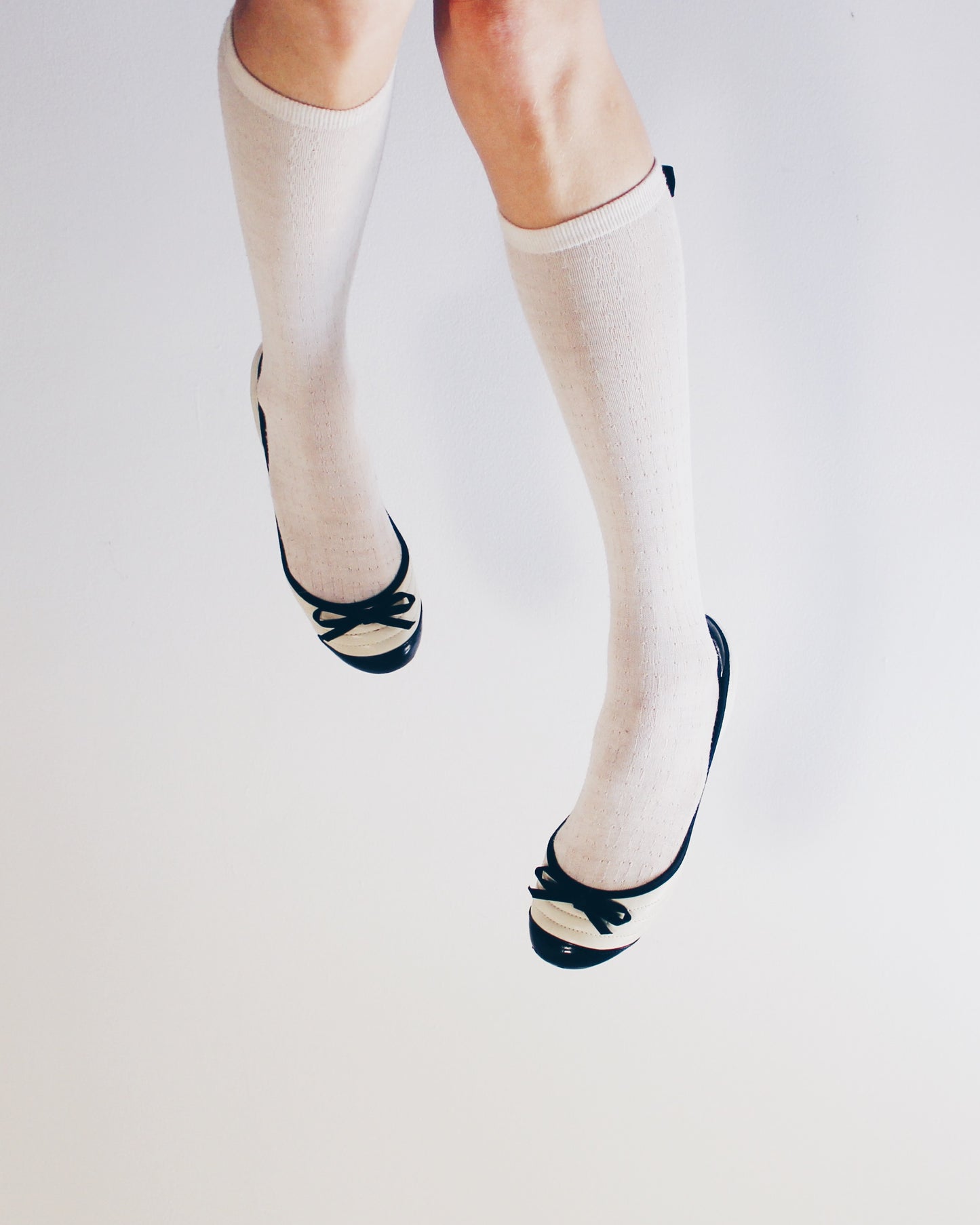 White and black bow adornment Y2K flats — Cute Bow Detail • Scholarly Coquette Ballet Shoes
