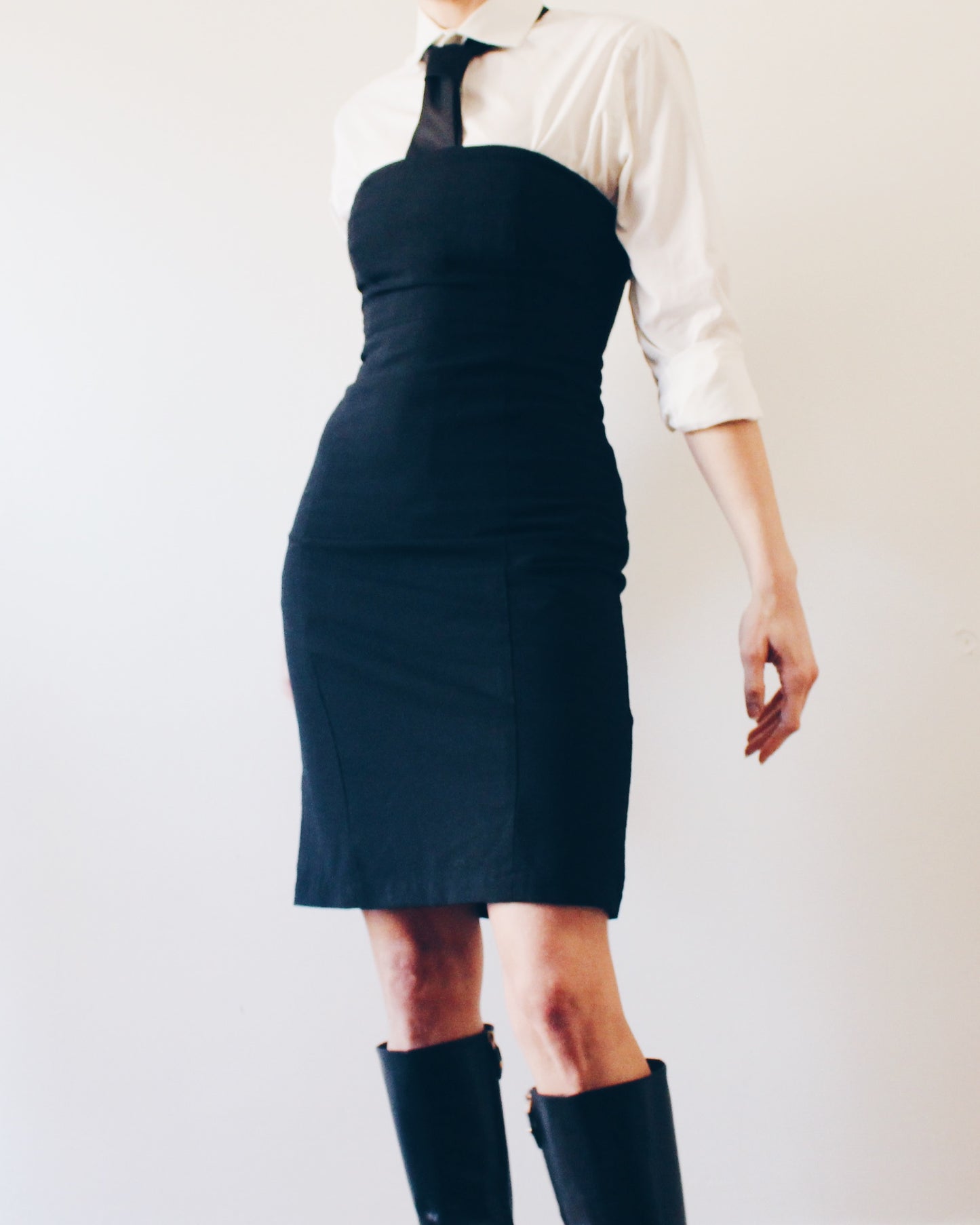 90s Chic Revival: Sleeveless Black Dress for Effortless Elegance / minimalist bodycon little black dress