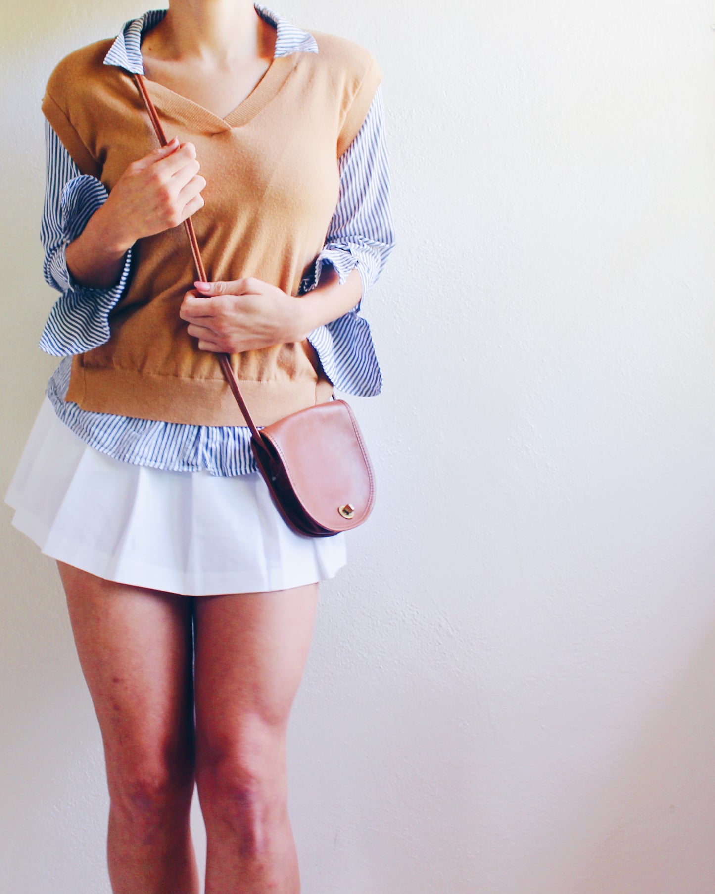 Tan Knit Layered Vest Top with Blue‑White Striped Shirt Sleeves & Collar – Academic Layering Blouse Style