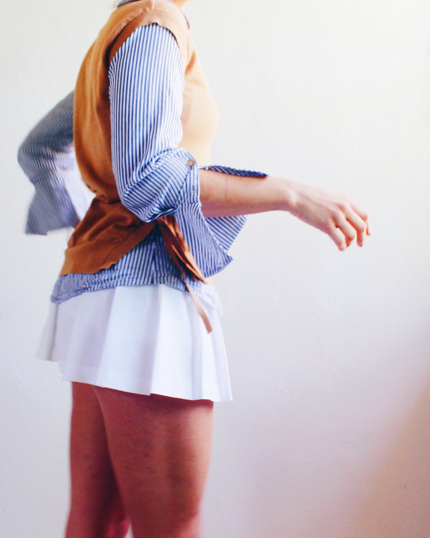 Tan Knit Layered Vest Top with Blue‑White Striped Shirt Sleeves & Collar – Academic Layering Blouse Style