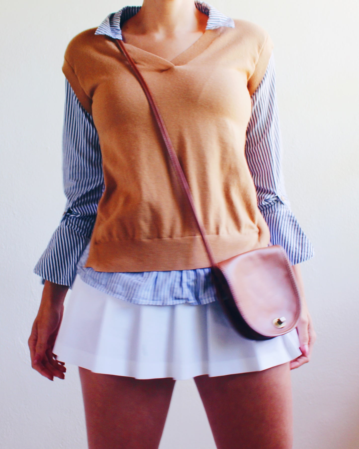 Tan Knit Layered Vest Top with Blue‑White Striped Shirt Sleeves & Collar – Academic Layering Blouse Style