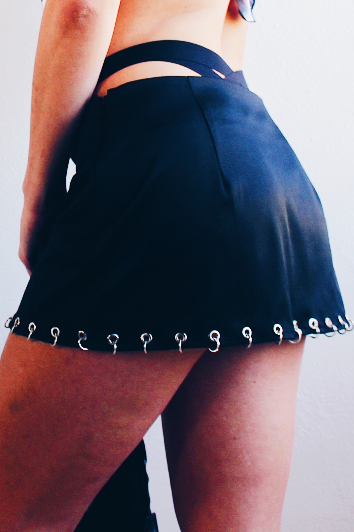 Edgy Contemporary Black Satin Mini Skirt - Upcycled Y2K Style with Grommets and Chain Links