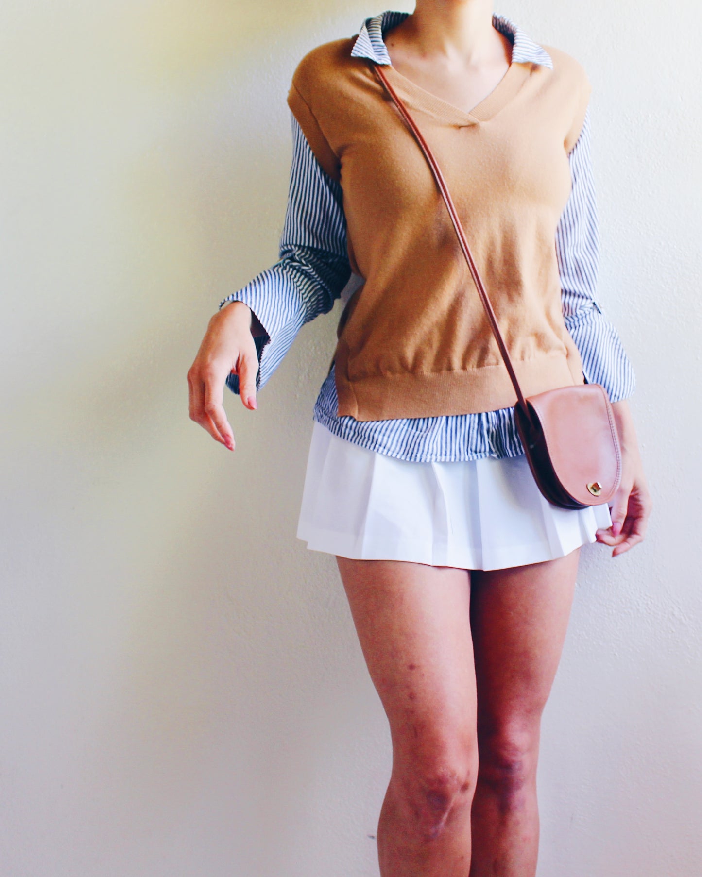 Tan Knit Layered Vest Top with Blue‑White Striped Shirt Sleeves & Collar – Academic Layering Blouse Style