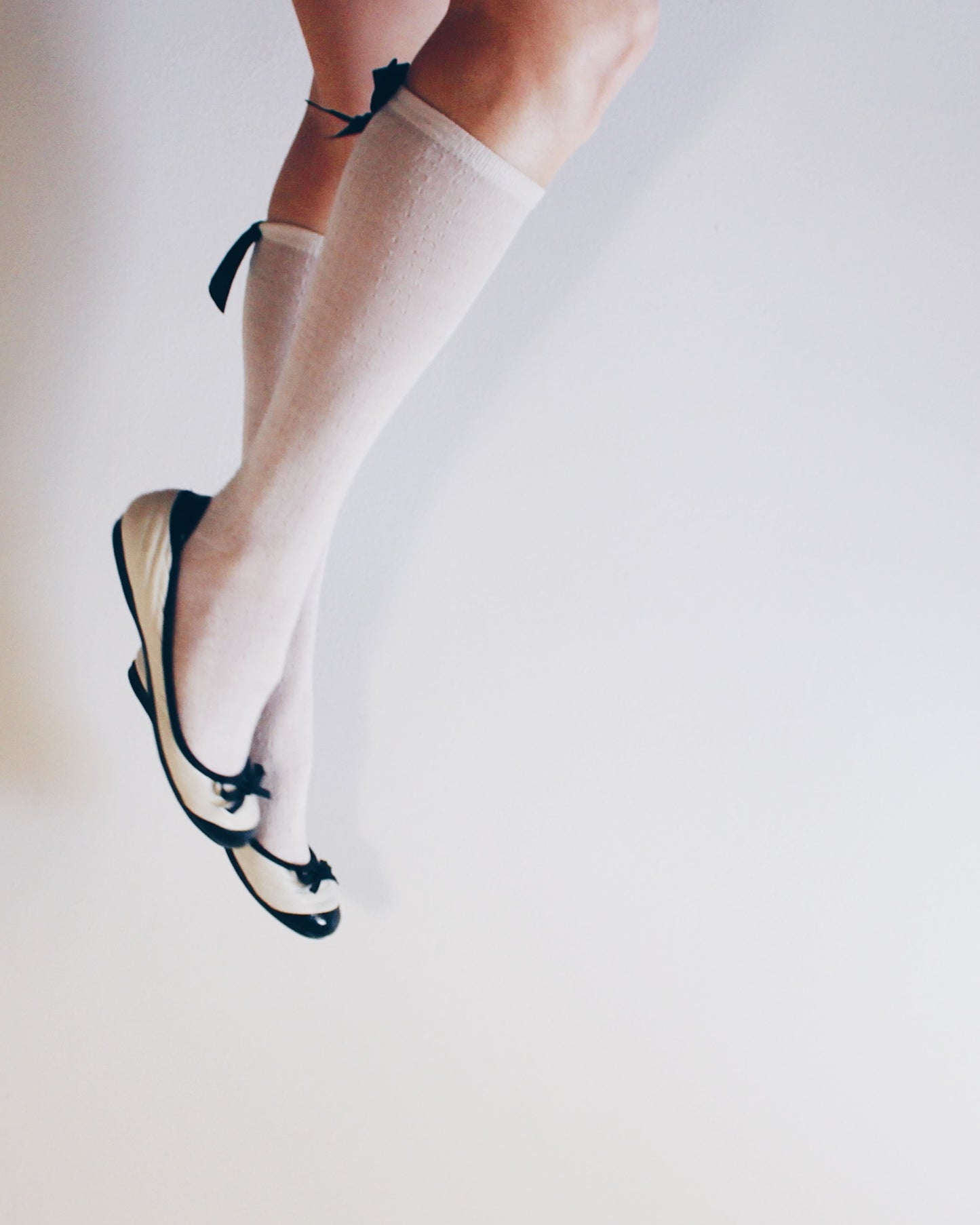 White and black bow adornment Y2K flats — Cute Bow Detail • Scholarly Coquette Ballet Shoes