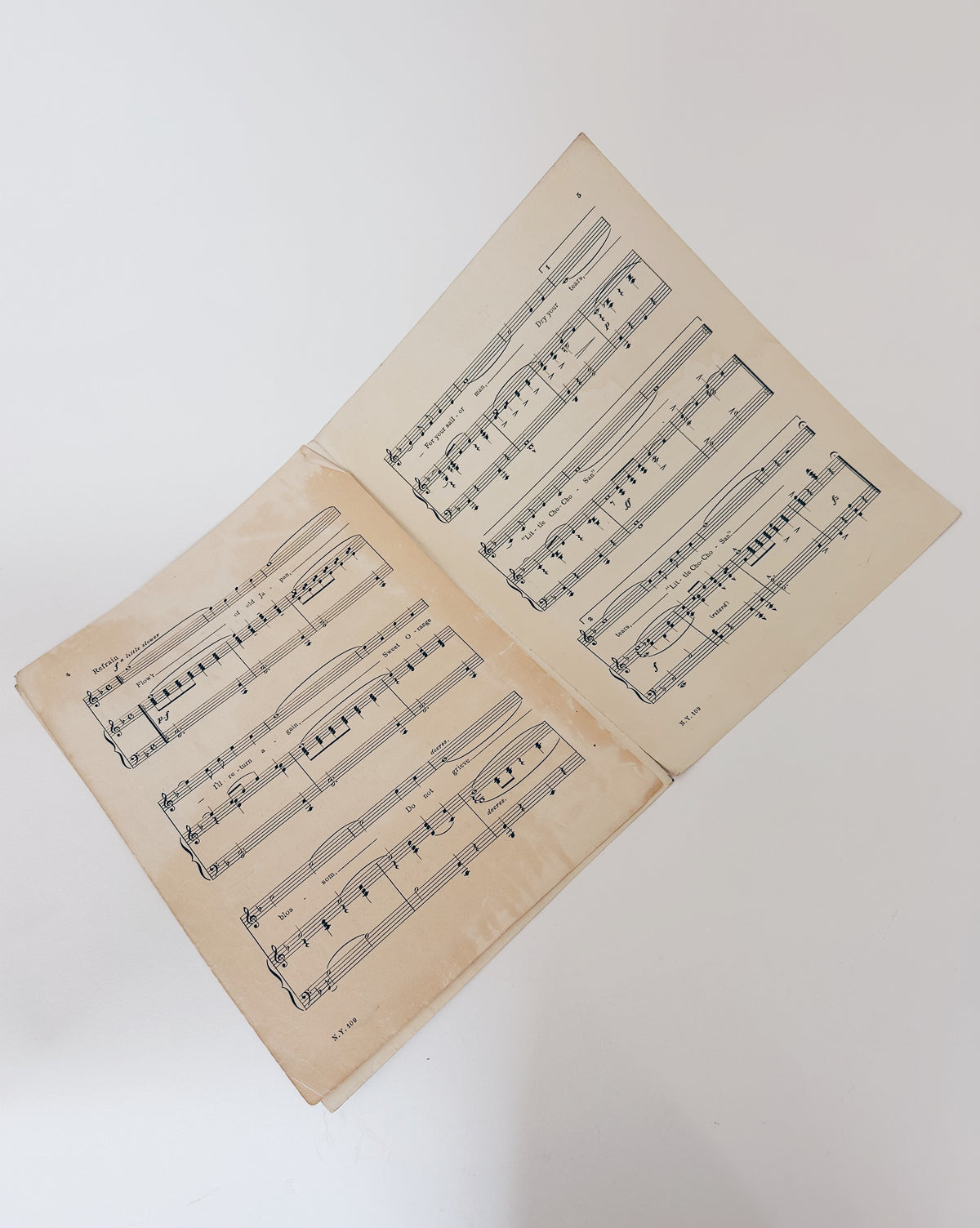 Antique sheet music: the Cho Cho San by G Puccini featuring a screen print illustration of a geisha.Antique Sheet Music Cho Cho San by Puccini, Madama Butterfly Opera, Geisha Screen Print Illustration, Vintage Ephemera Wall Art