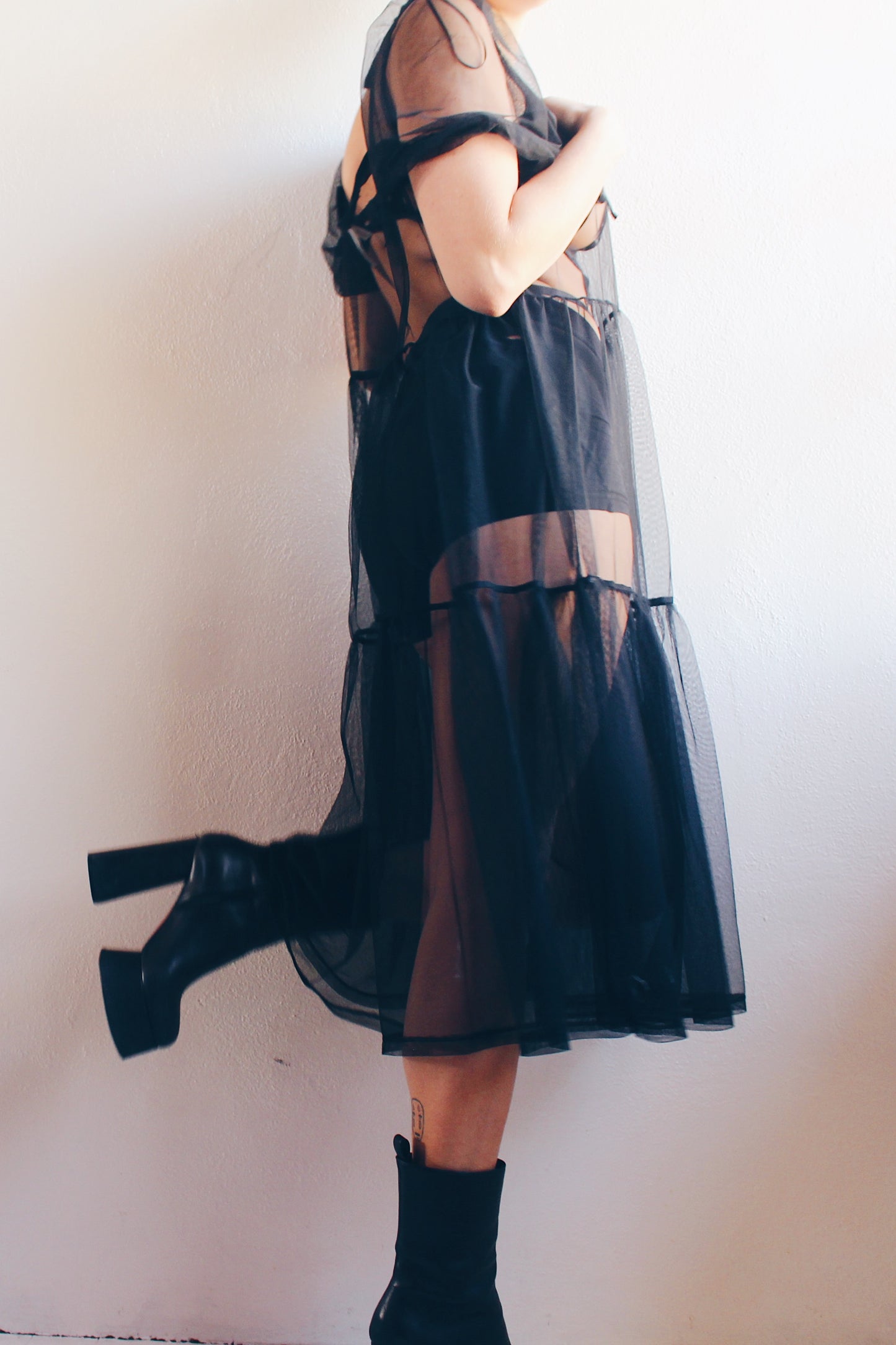 Enchanting Elegance: Sheer Black Babydoll Dress with Puffy Sleeves for Dark Days