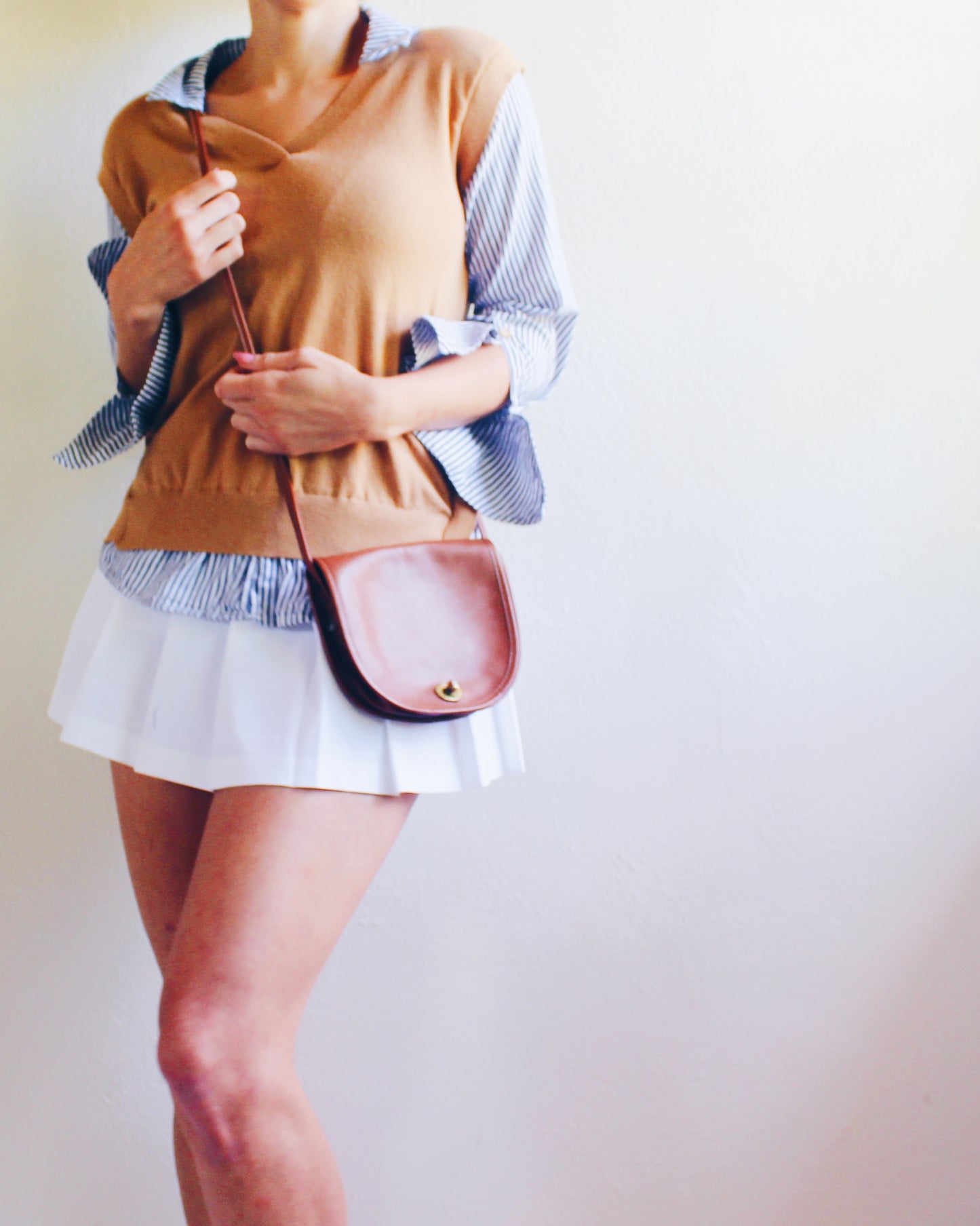 Tan Knit Layered Vest Top with Blue‑White Striped Shirt Sleeves & Collar – Academic Layering Blouse Style