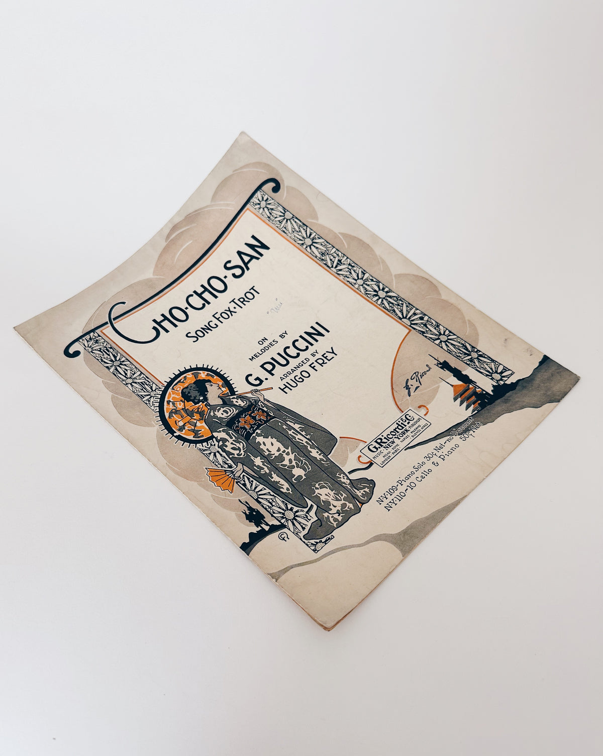 Antique sheet music: the Cho Cho San by G Puccini featuring a screen print illustration of a geisha.Antique Sheet Music Cho Cho San by Puccini, Madama Butterfly Opera, Geisha Screen Print Illustration, Vintage Ephemera Wall Art