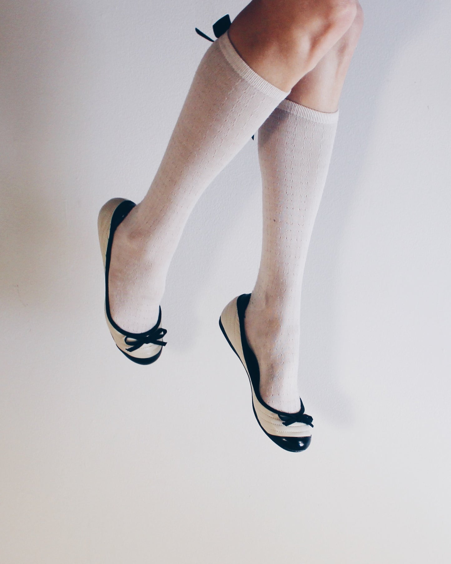 White and black bow adornment Y2K flats — Cute Bow Detail • Scholarly Coquette Ballet Shoes