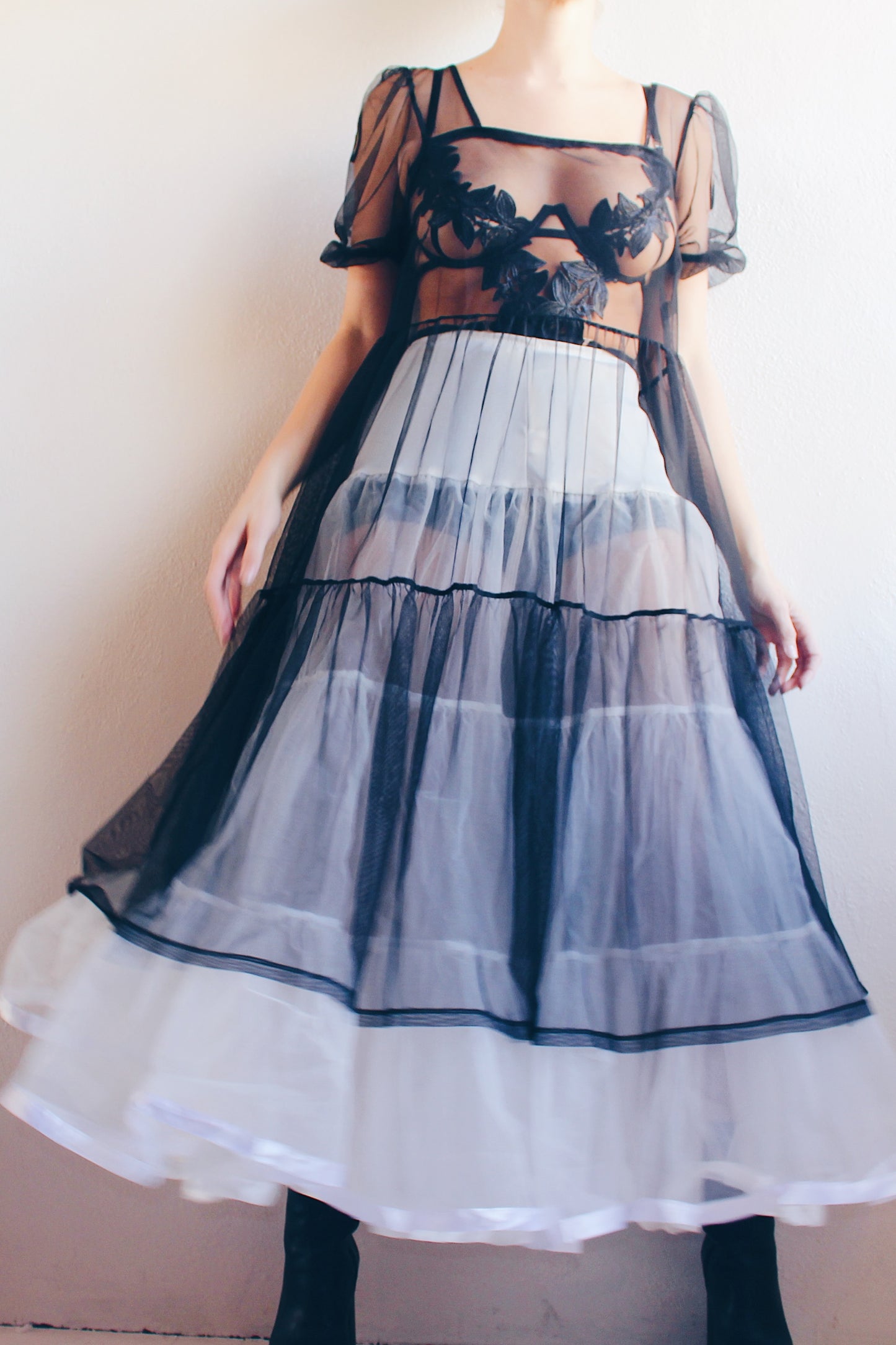 Enchanting Elegance: Sheer Black Babydoll Dress with Puffy Sleeves for Dark Days