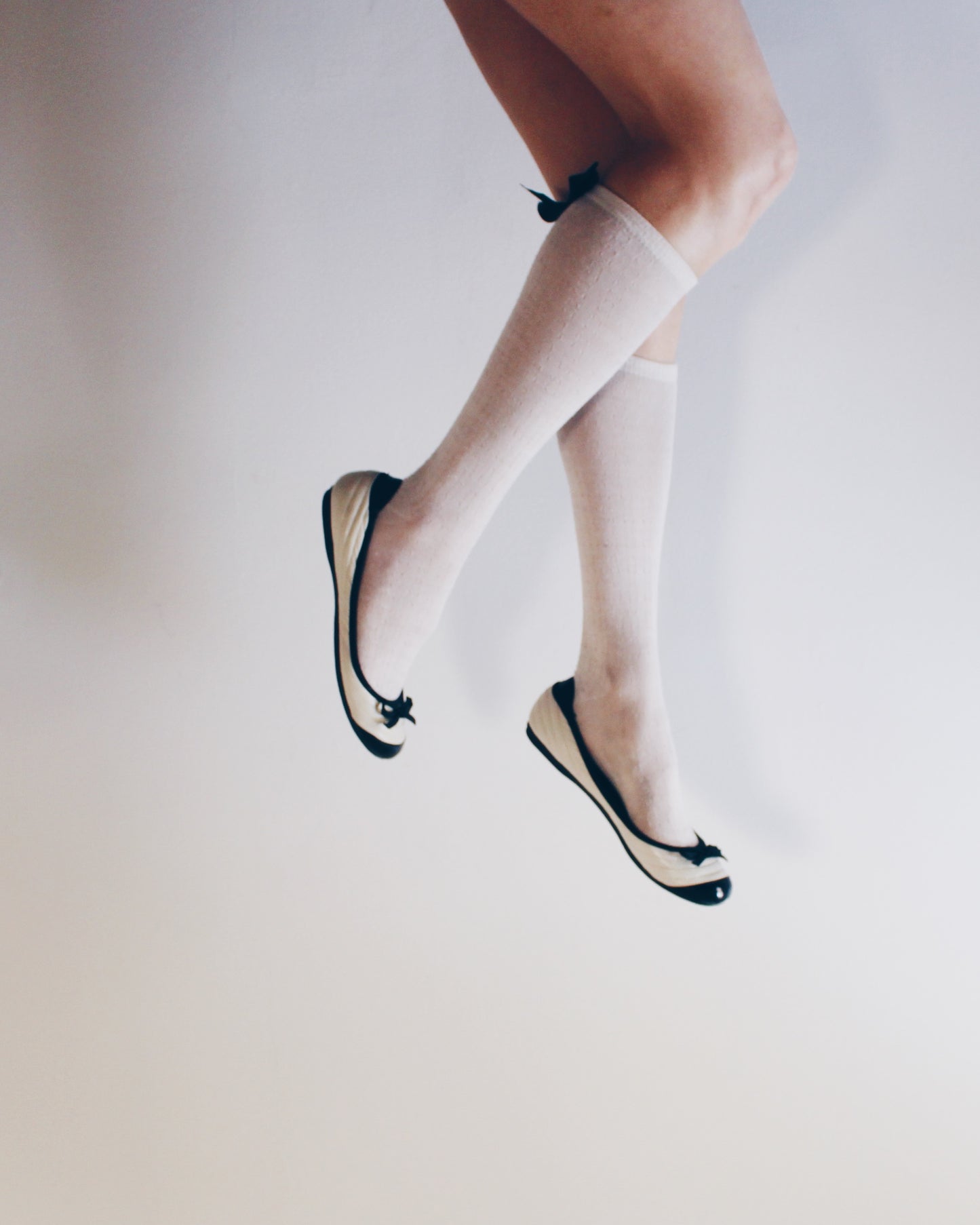 White and black bow adornment Y2K flats — Cute Bow Detail • Scholarly Coquette Ballet Shoes