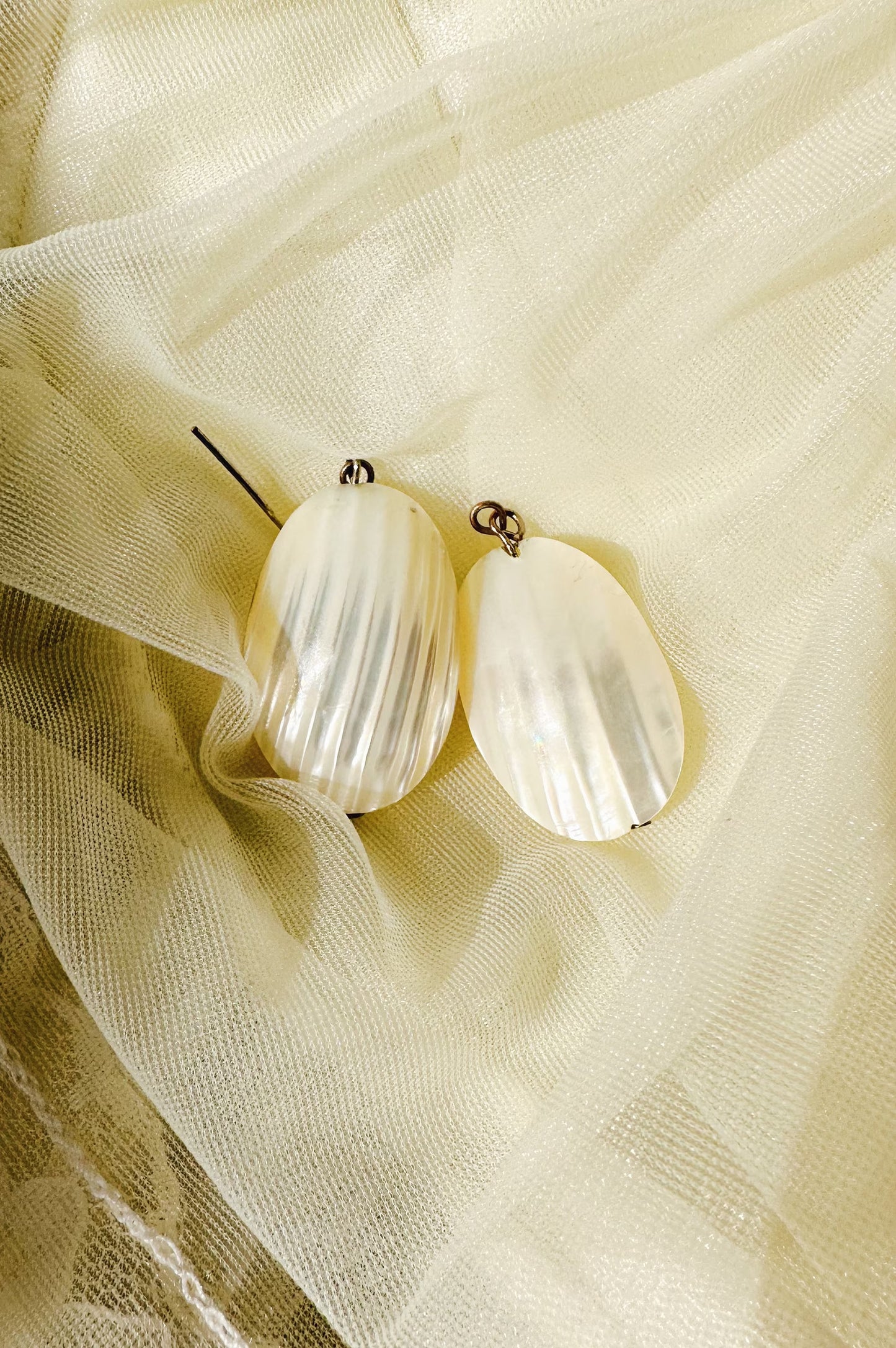 oval mother of pearl dangle earrings